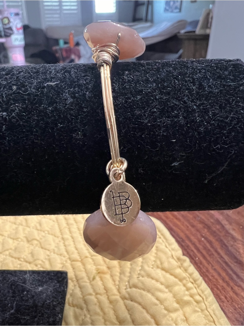 Bourbon and Bowties Gold-tone Bangle with Blush Stone Charm
